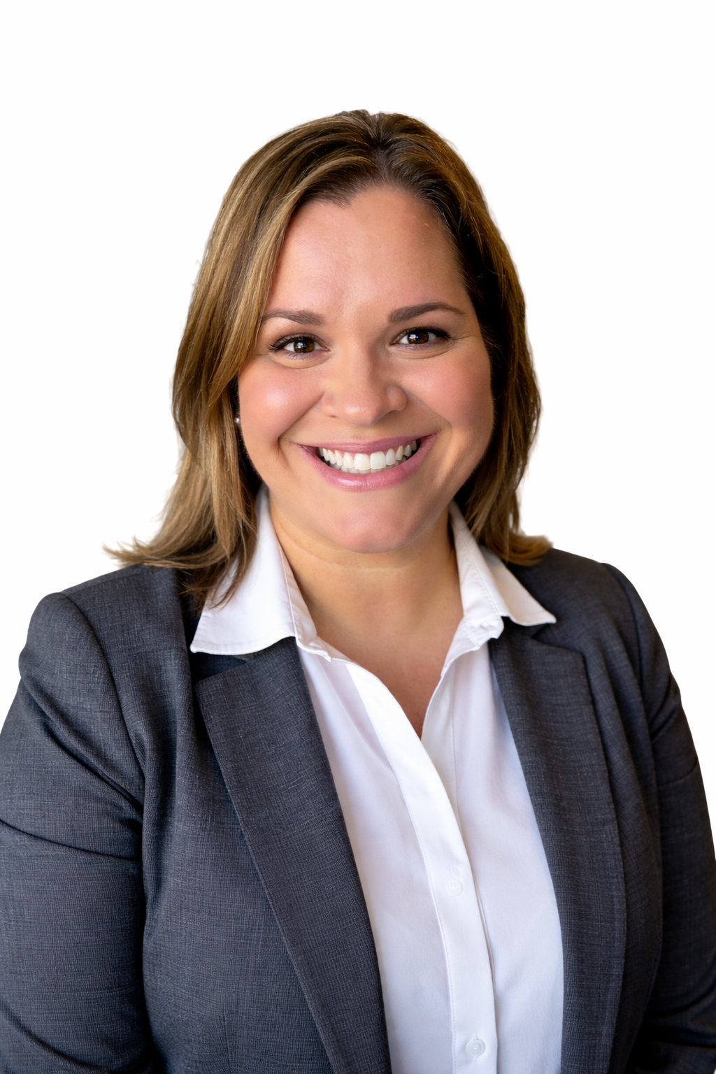 A woman in a grey business suit and white shirt, representing the Extendicare leadership team, smiles at the camera against a plain white background.